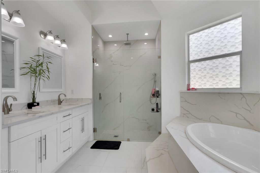 Bathroom with shower and tub